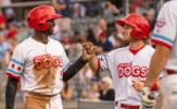Crouse, Grier Homer in Dogs Decisive Victory